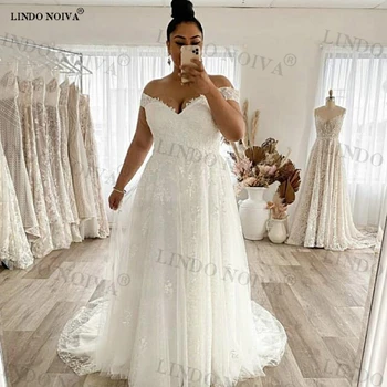 לינדו NOIVA Vestido בתוספת גודל תחרה, אפליקציות טול שמלות חתונה מחוץ הכתף ללא משענת Orienta שמלת רכבת לטאטא החלוק De Mariée